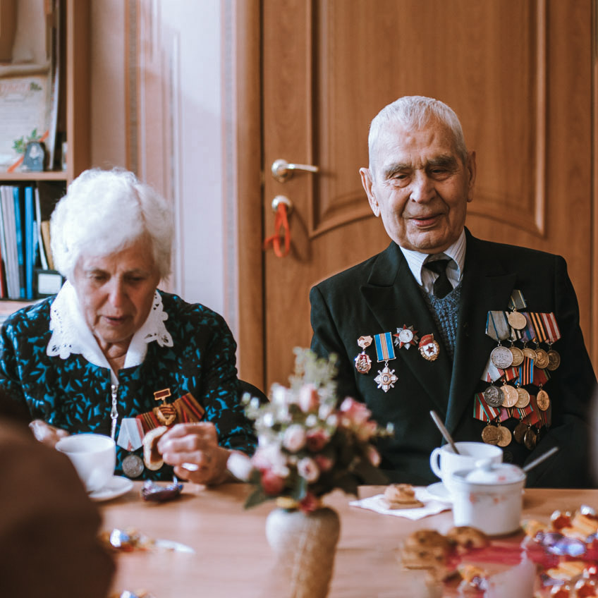 veteran and spouse sitting at table